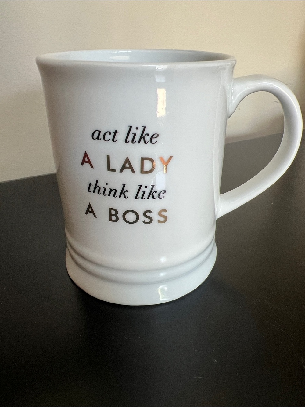 Fringe Studio White Ceramic Mug with  Gold Foil and Black text.
